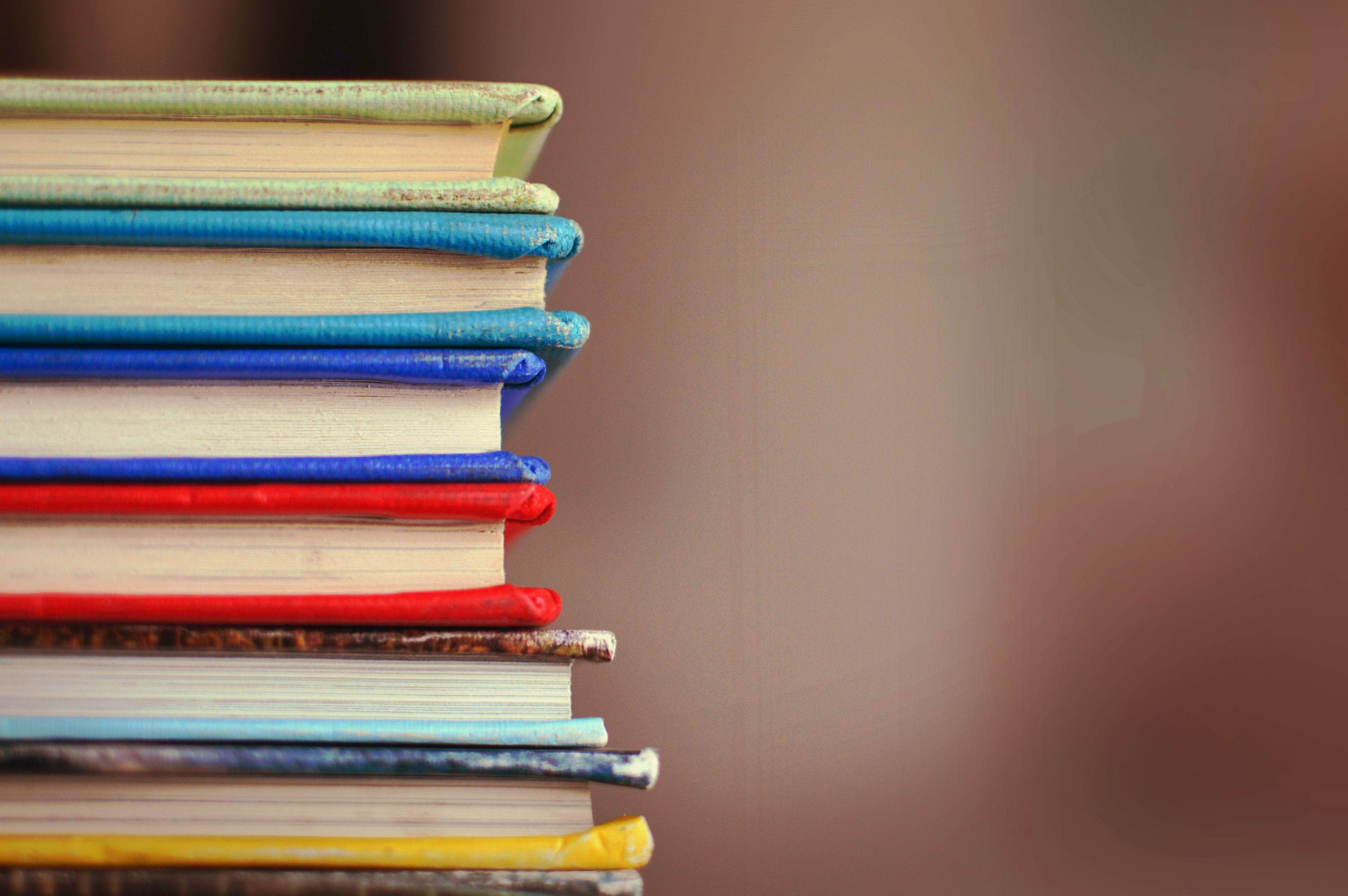 shallow focus photography of books